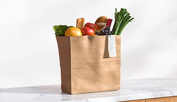 Fordelene med Kraft Paper Shopping -vesker for forhandlere og merker